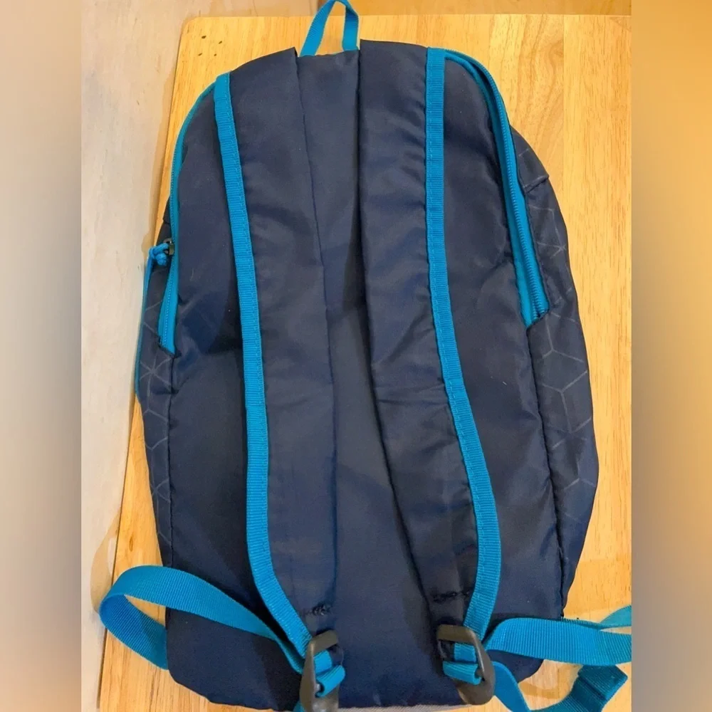 Ozark Trail 10 Liter Hiking Backpack Blue & Embossed Pattern